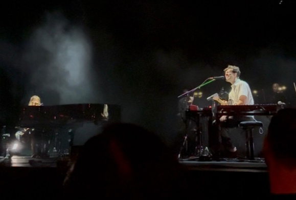 Image of Ghost performing on stage at concert