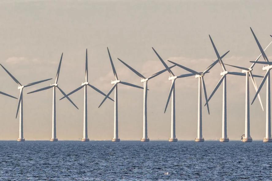 Wind turbines operating across the offshore horizon