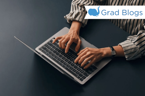 Image of hands typing on a laptop computer