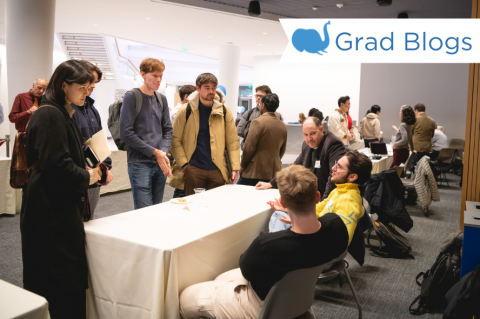 A group of students gather around a table for a conversation